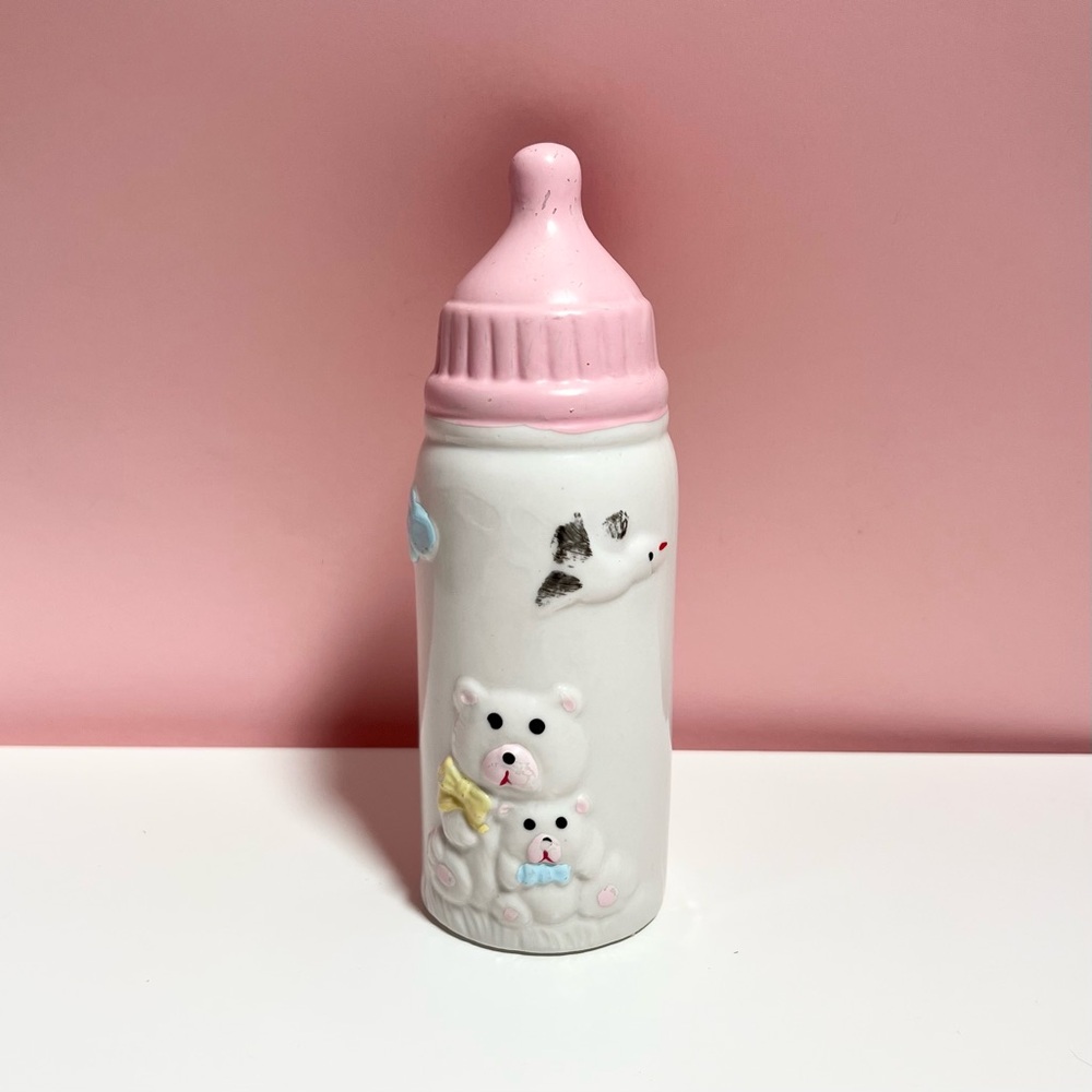 Vintage retro 80s pastel baby bottle coin bank with teddy bears